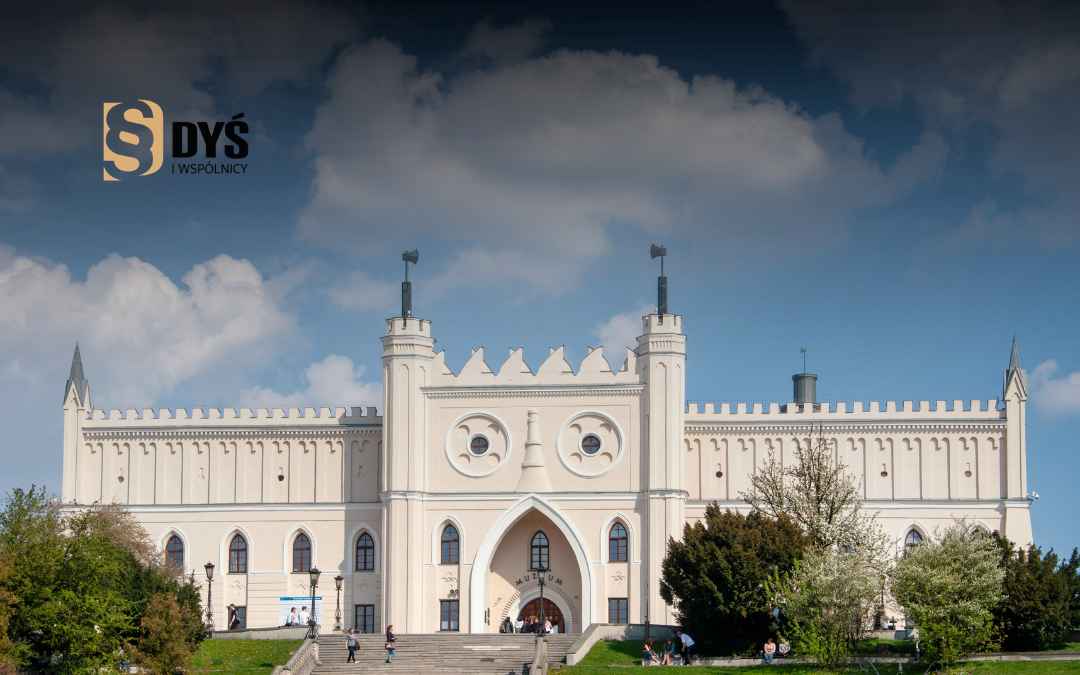 Zamek w Lublinie w słoneczny dzień ilustruje temat: lokalna kancelaria frankowa Lublin.